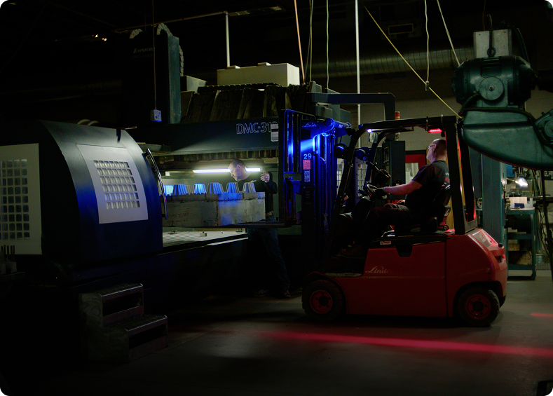 Forklift and CNC machine in Shuert manufacturing